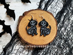 Load image into Gallery viewer, Skeleton Puppy Dogs - Halloween Earrings - Glitter Black Acrylic Handmade Jewelry
